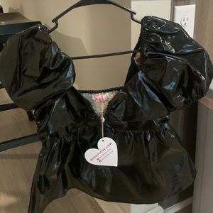 Black leather buddy love top.